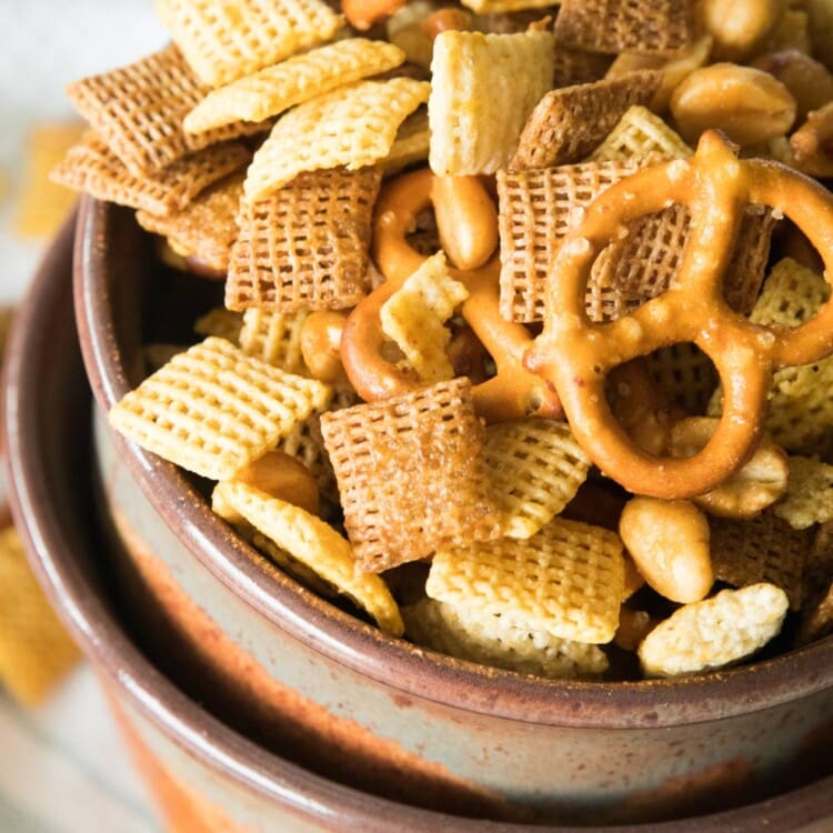 Honey Mustard Snack Mix in a brown bowl stacked in a larger brown bowl