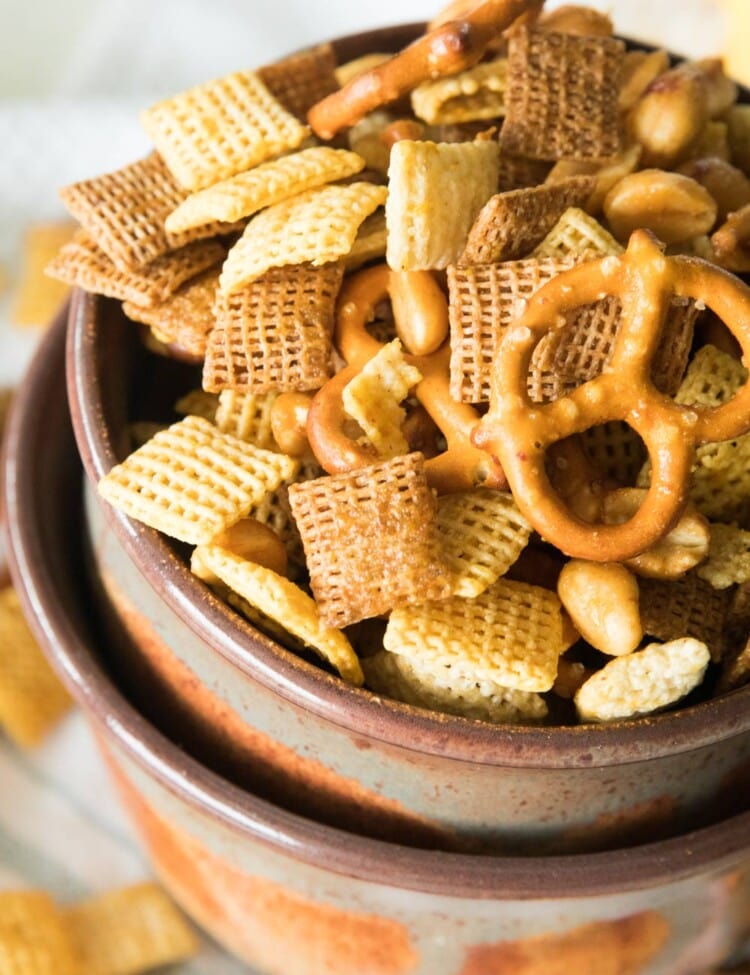 Honey Mustard Snack Mix in a brown bowl stacked in a larger brown bowl