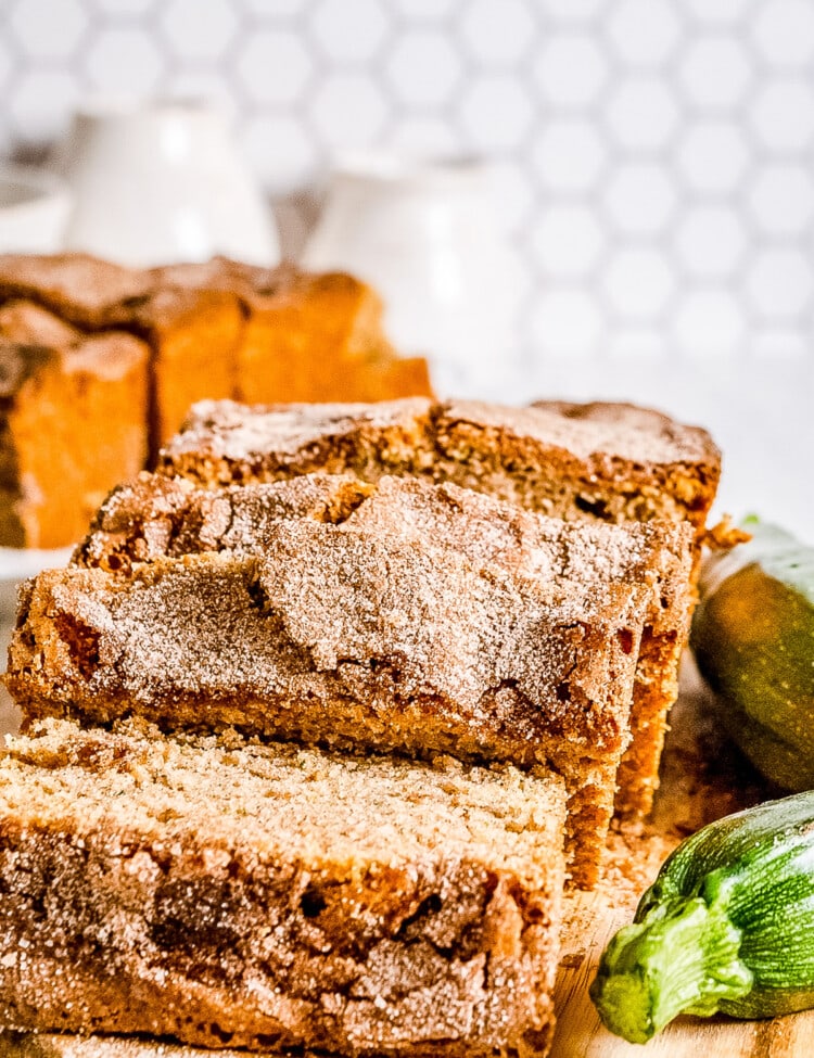 Zucchini Bread that's sliced and starting to lie down on cutting board