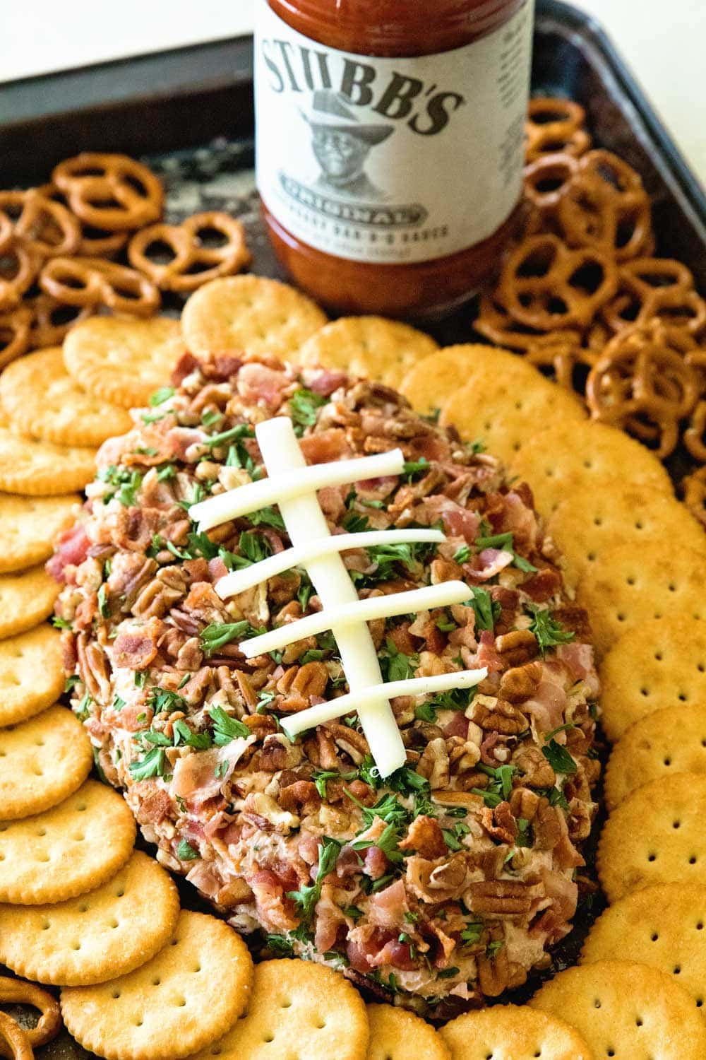 Cheese ball recipe shaped into football