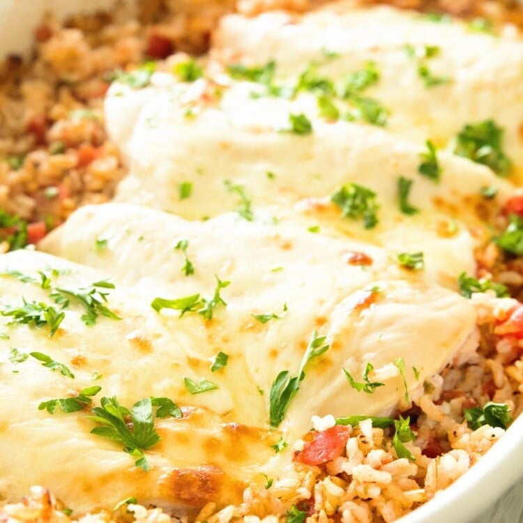 Italian Cheesy Chicken and Rice Casserole in a white baking dish