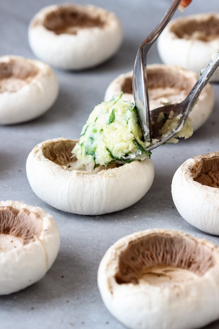 Garlic Stuffed Mushrooms. This quick and easy appetizer is rich and full of flavors thanks to garlic, butter, parsley and cheese stuffing. It’s the perfect party food!