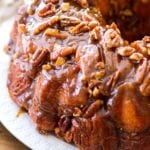 Bundt cake shaped maple pecan monkey bread on a white plate