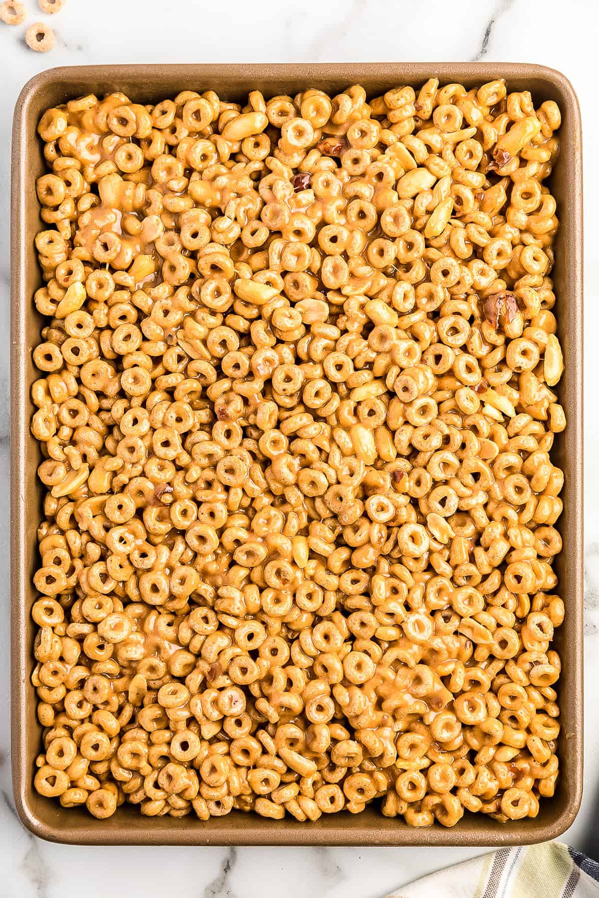 Overhead image of a pan of Peanut Butter Cheerio Bars