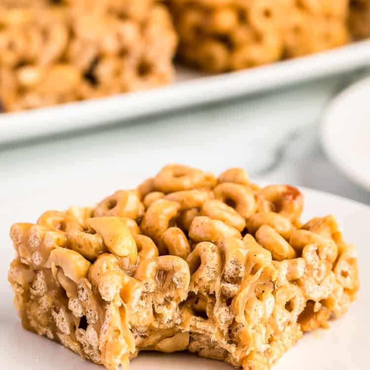 Peanut Butter Cheerio Bar on plate with bite gone