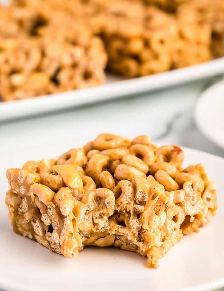 Peanut Butter Cheerio Bar on plate with bite gone