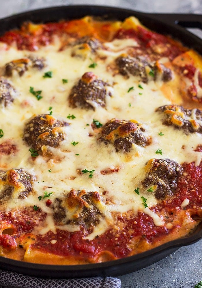 This Cheesy Italian Meatballs and Pasta is pure comfort food! Tender and juicy meatballs baked in an easy homemade pasta sauce and cheesy pasta.