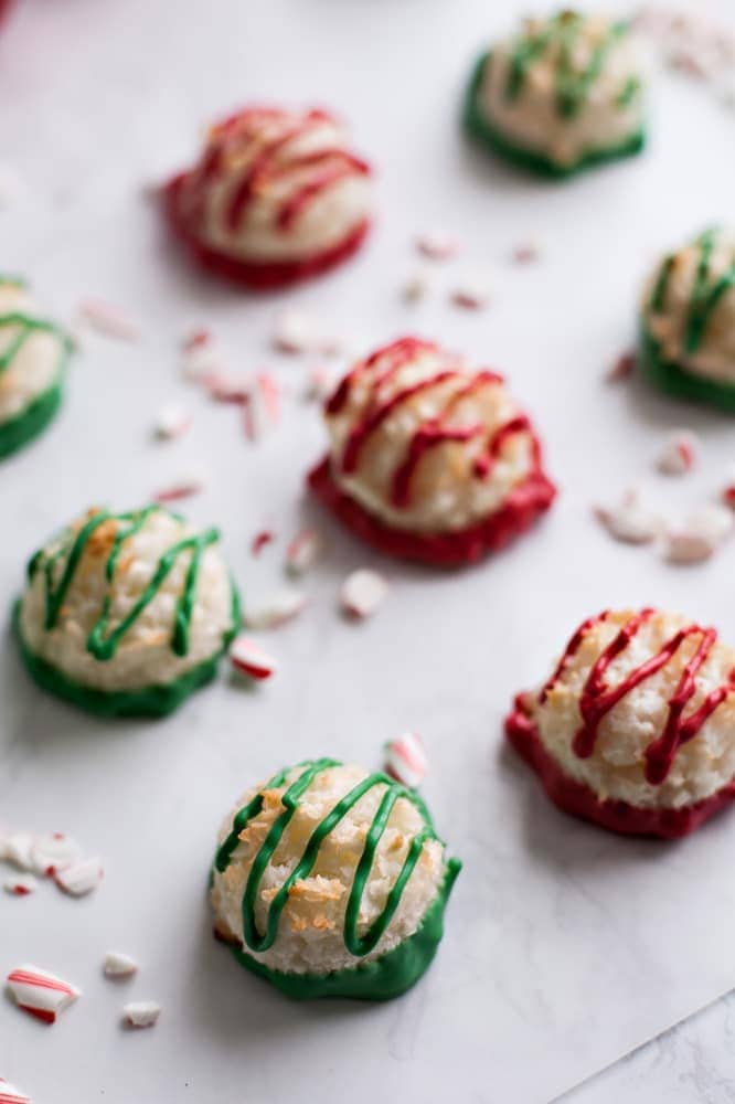 These Peppermint Macaroons are dipped in festive red and green vanilla chocolate candy.
