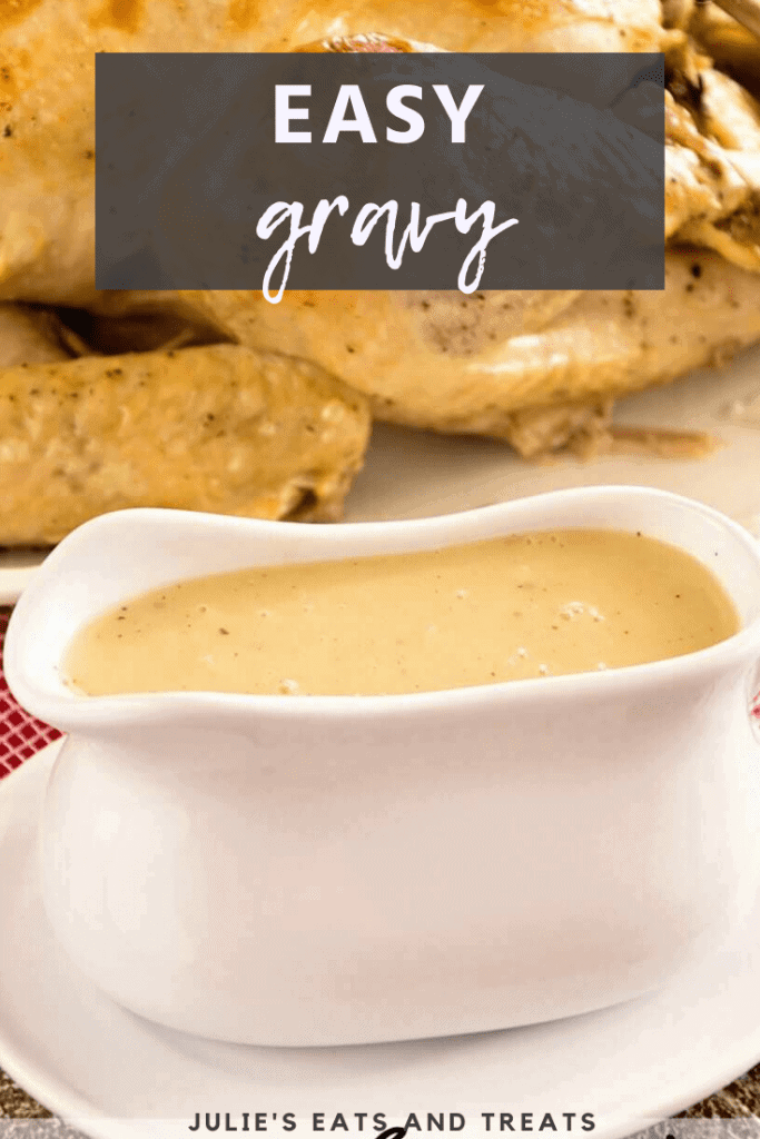 A white gravy boat full of gravy with a turkey in the background