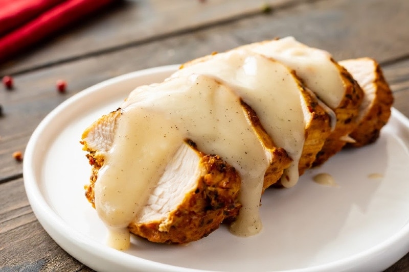 homemade gravy over sliced pork