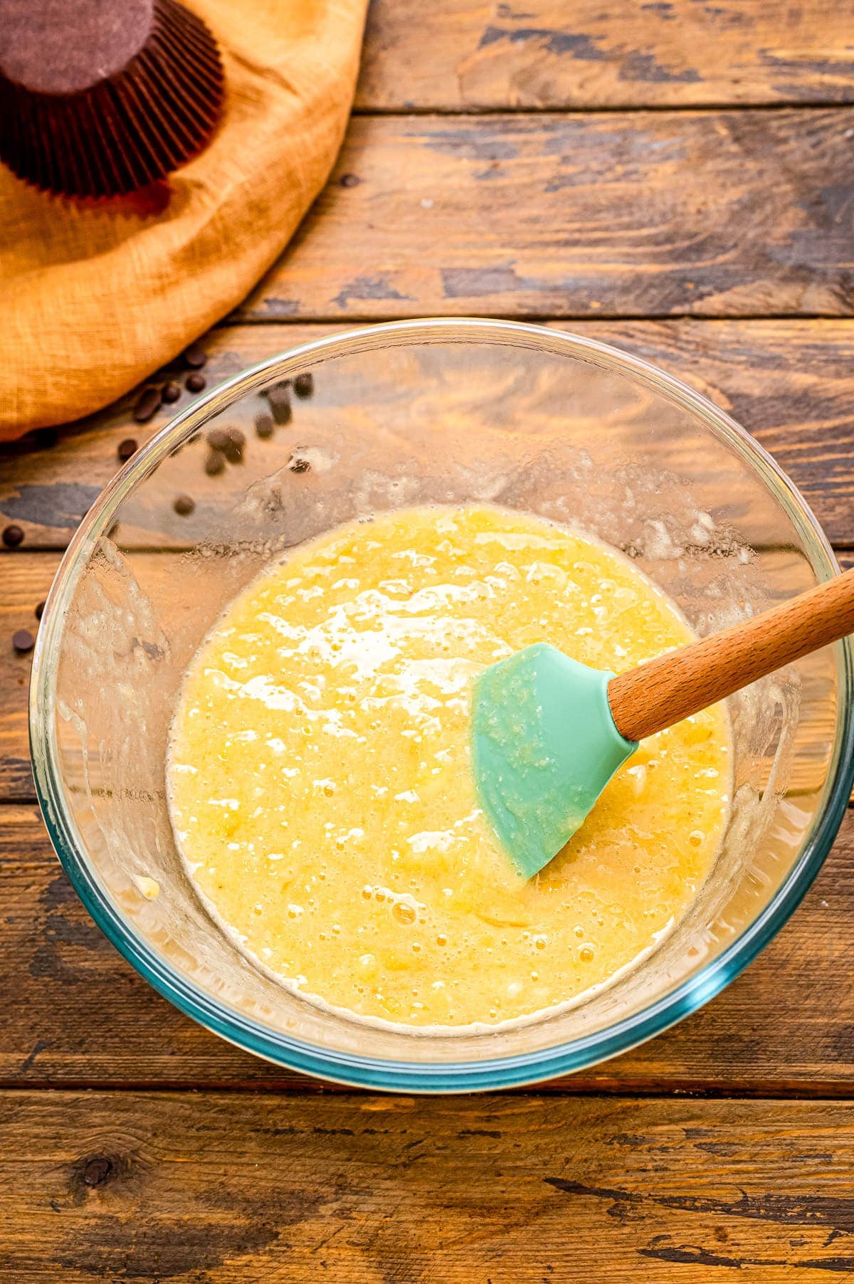 Banana Chocolate Chip Muffins batter mixed in glass bowls