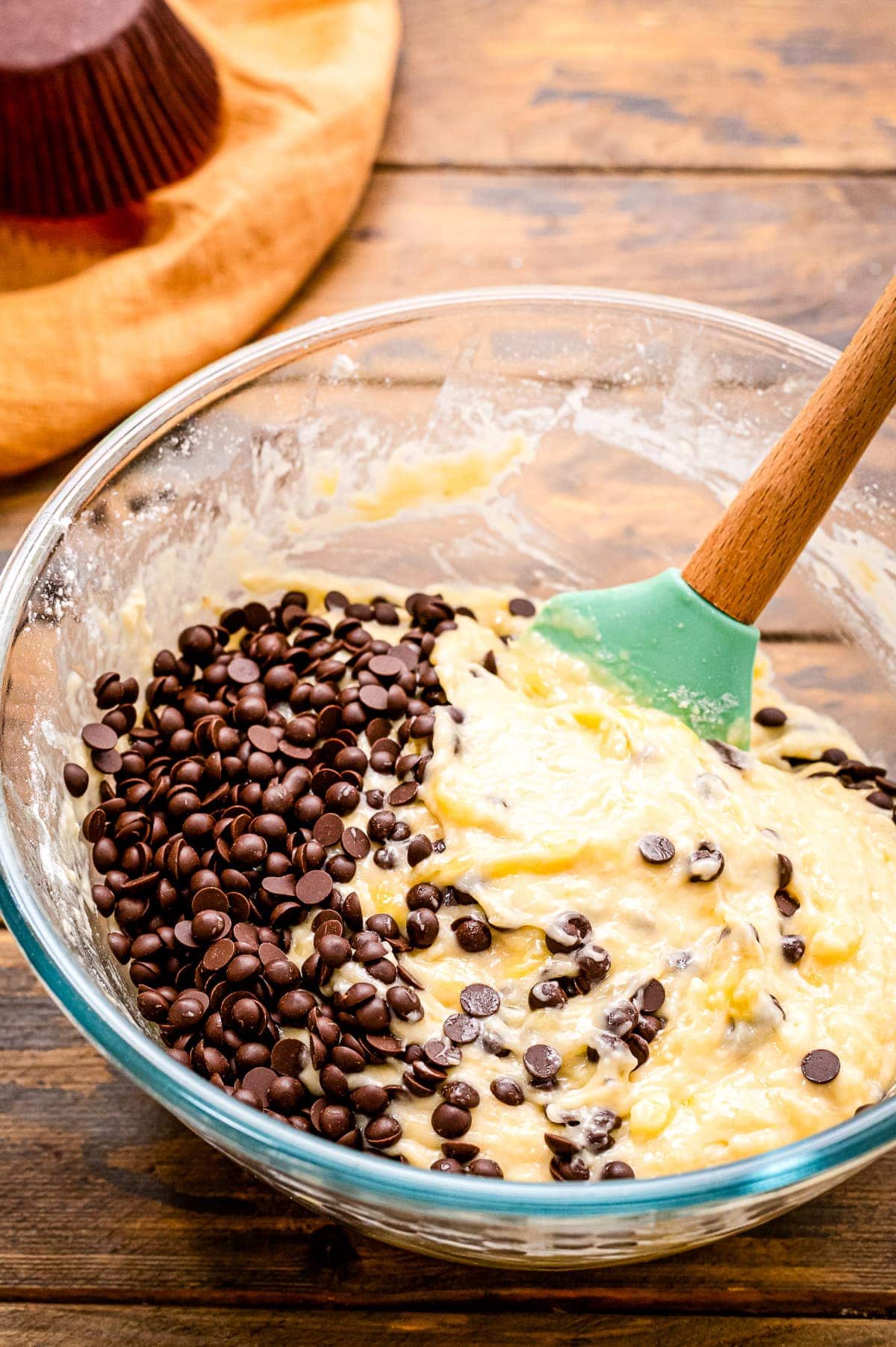 Banana Chocolate Chip Muffins batter with chocolate chips on side before mixing