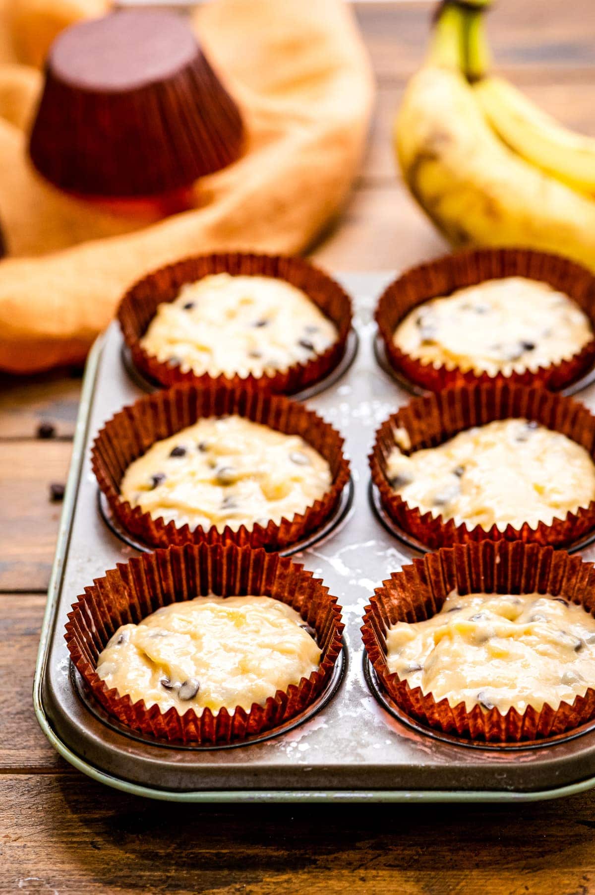 Banana Chocolate Chip Muffins in muffin tin before baking