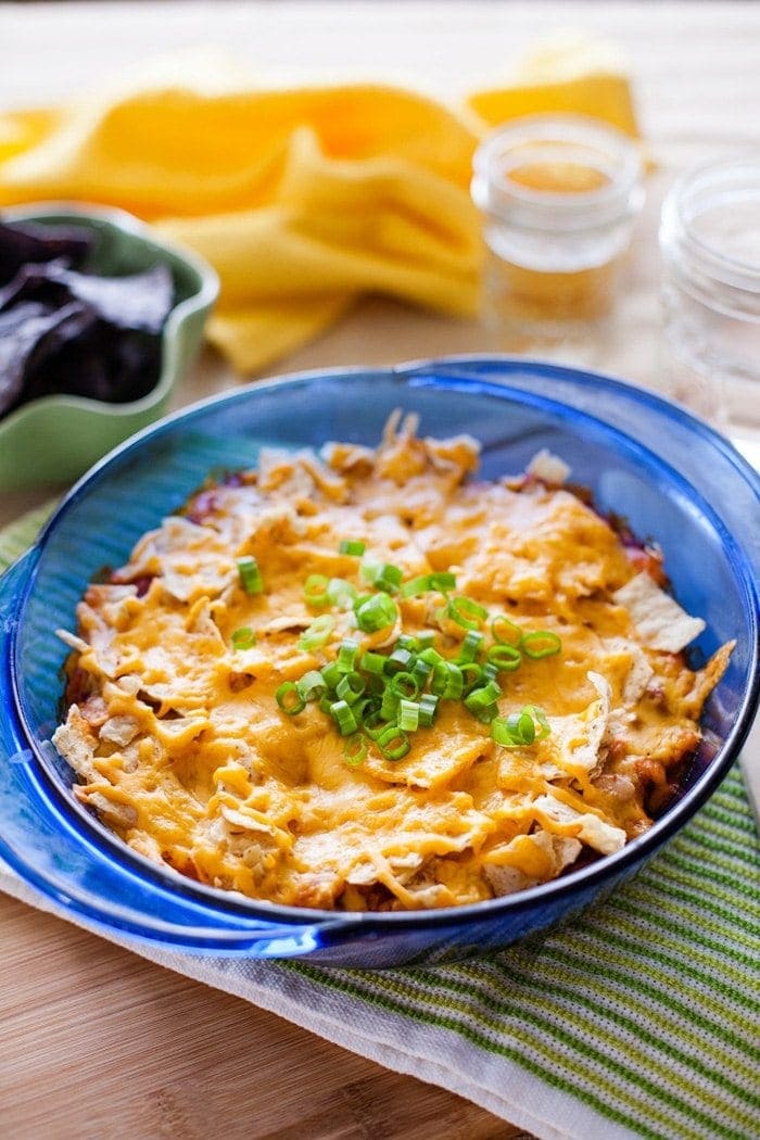This simple Mexican Casserole is a perfect mix of textures and flavors. Full of hearty beef and beans and topped with cheese and corn chips, it's a family-pleasing meal great for any night of the week!