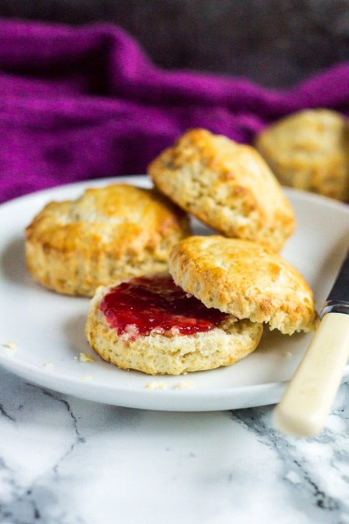 Classic English Scones - These deliciously fluffy scones are perfect served warm or cold with clotted cream and jam. Pair with your morning cup of tea for an indulgent breakfast!