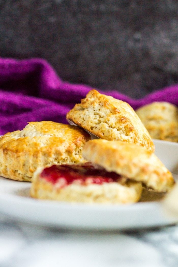 Classic English Scones - These deliciously fluffy scones are perfect served warm or cold with clotted cream and jam. Pair with your morning cup of tea for an indulgent breakfast! Classic English Scones - These deliciously fluffy scones are perfect served warm or cold with clotted cream and jam. Pair with your morning cup of tea for an indulgent breakfast!