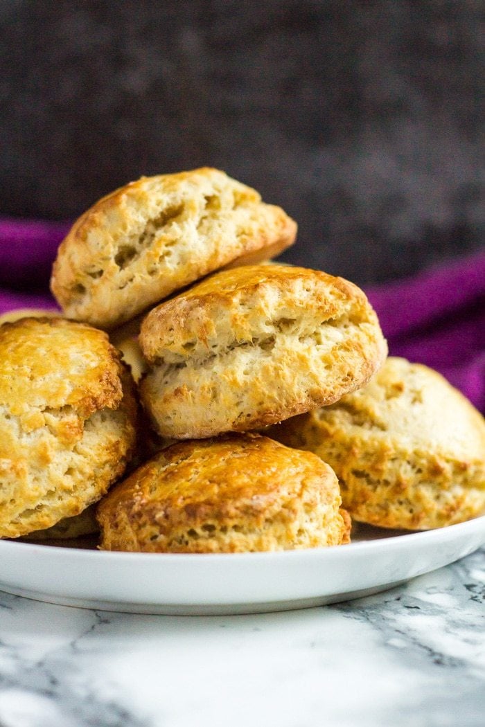 Classic English Scones - These deliciously fluffy scones are perfect served warm or cold with clotted cream and jam. Pair with your morning cup of tea for an indulgent breakfast! Classic English Scones - These deliciously fluffy scones are perfect served warm or cold with clotted cream and jam. Pair with your morning cup of tea for an indulgent breakfast!