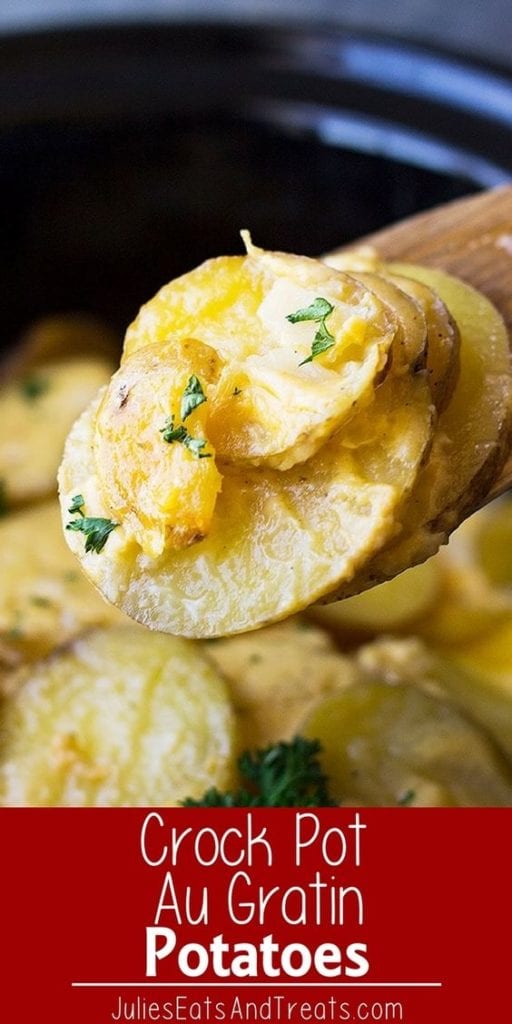 Crock pot au gratin potatoes on a wooden spoon