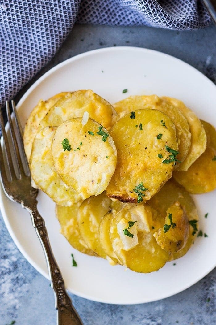 Top down view of Crock Pot Au Gratin Potatoes on a plate.