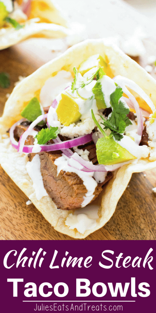 Chili lime steak taco bowl on a wood table