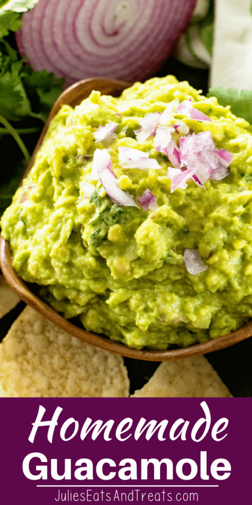 Homemade Guacamole in a brown bowl next to an onion and tortilla chips