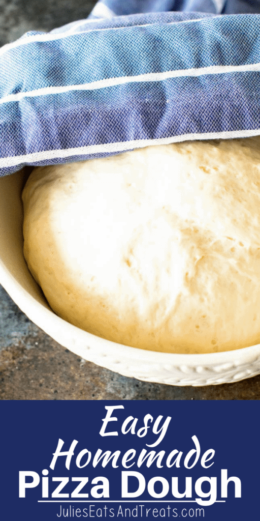 Homemade Pizza Dough in a white bowl half covered with a blue towel