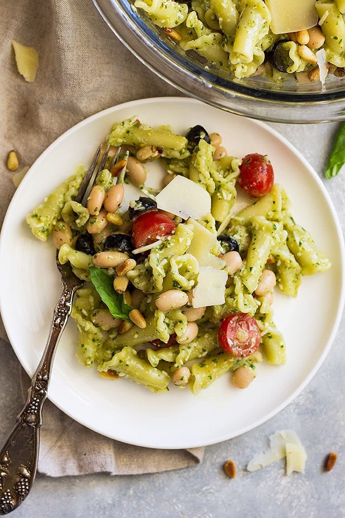 Top down view of plate of pasta salad with fork.