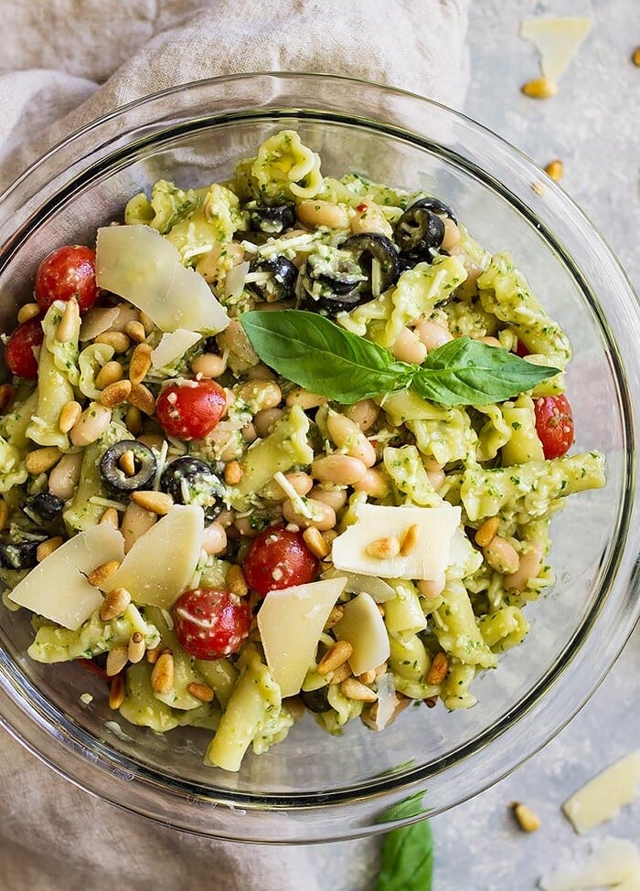 Top down view of Italian Pesto Pasta Salad in a glass bowl