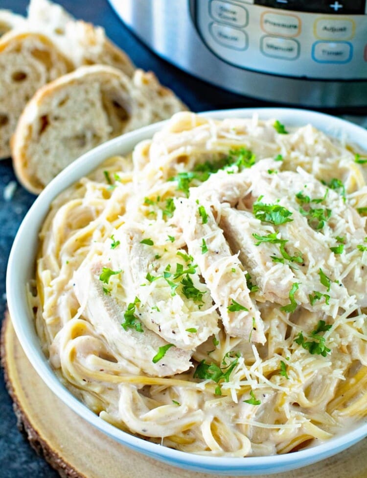 Pressure Cooker Chicken Alfredo in white bowl