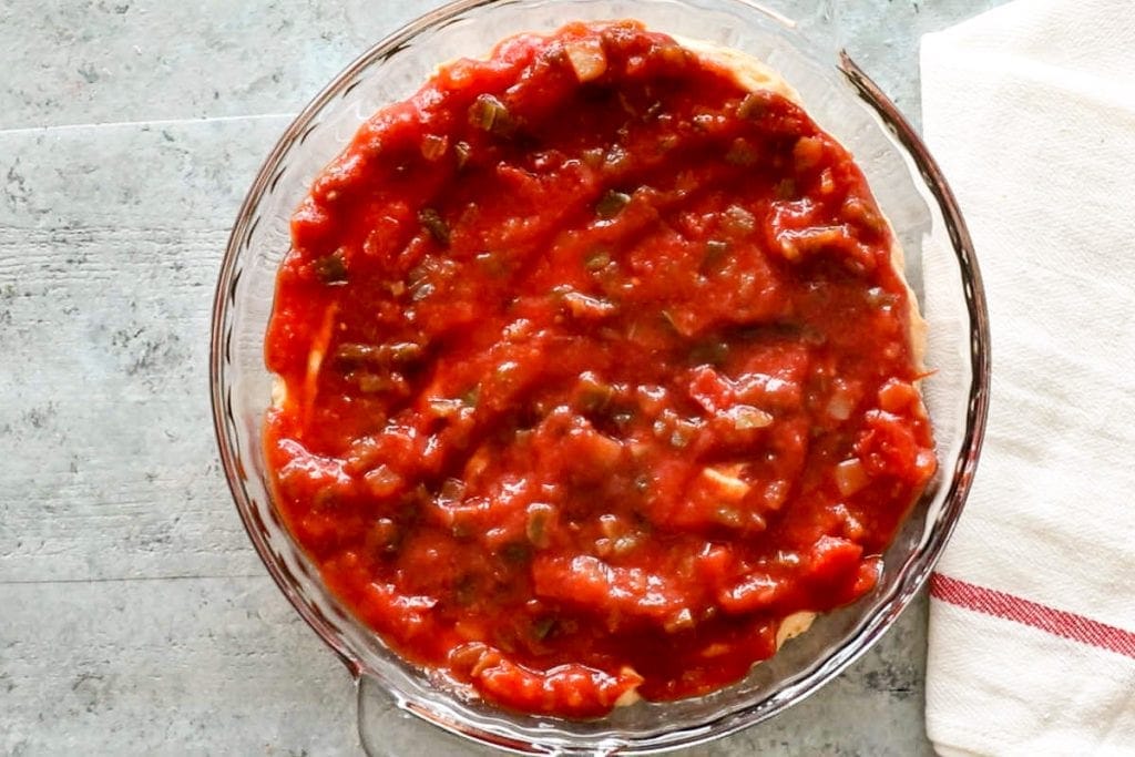 Glass pie plate with salsa layer