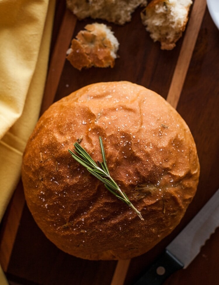Rosemary bread loaf on a cutting board