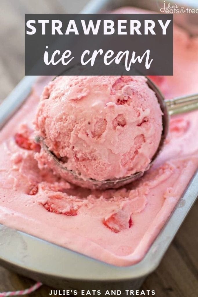 Strawberry ice cream in a metal loaf pan being scooped with a metal ice cream scoop