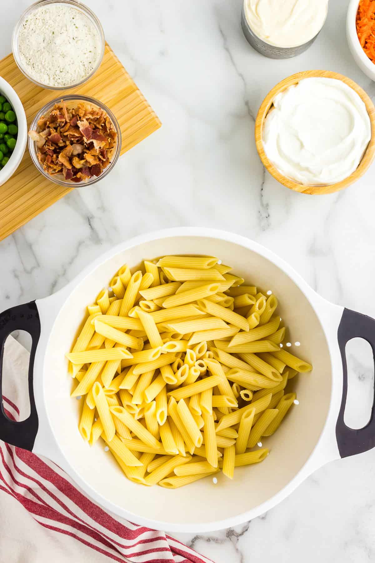 Penne pasta in colander