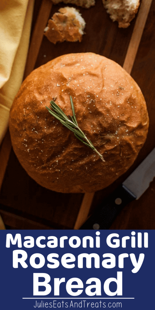 Macaroni Grill Rosemary Bread loaf on a cutting board from overhead