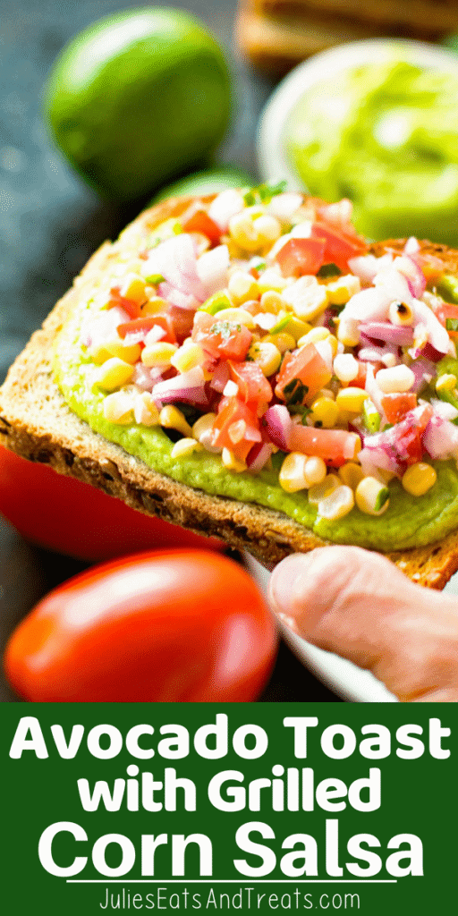 Hand holding Avocado Toast with corn salsa on top