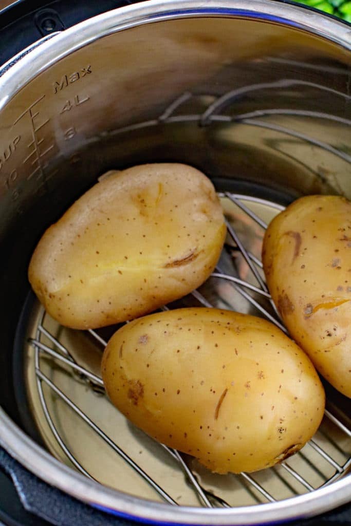 Baked Potatoes inside of Instant Pot on trivet