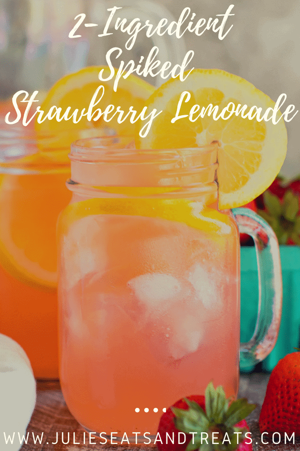 Vodka Strawberry Lemonade with lemon slices in a mason jar