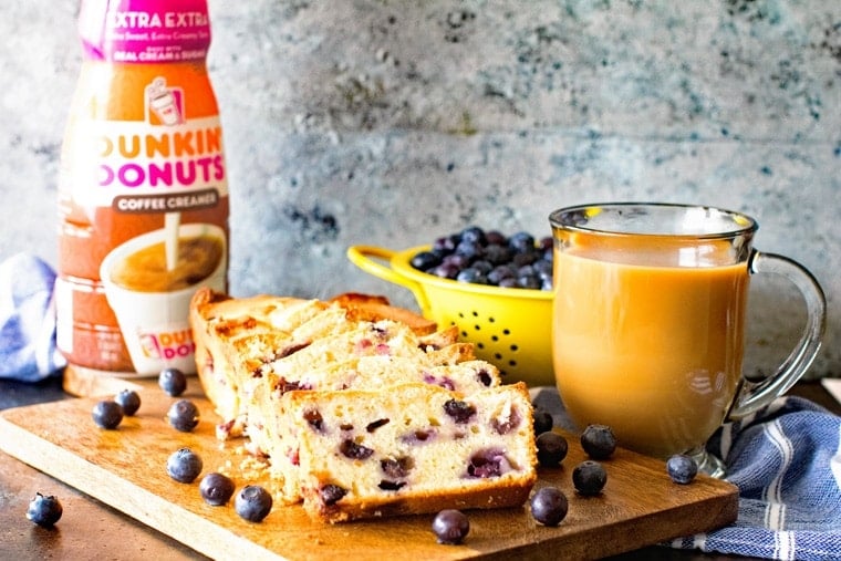 Blueberry Cream Cheese Bread on wooden cutting board