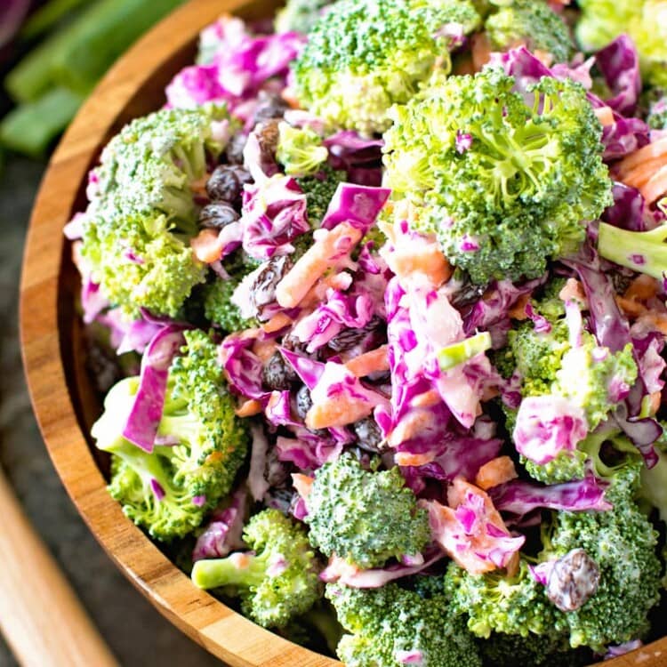 Light homemade broccoli slaw in brown bowl