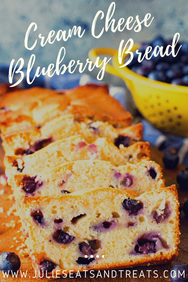 Cream cheese blueberry bread slices on a cutting board