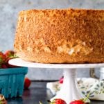 Homemade Angel Food Cake on white cake plate