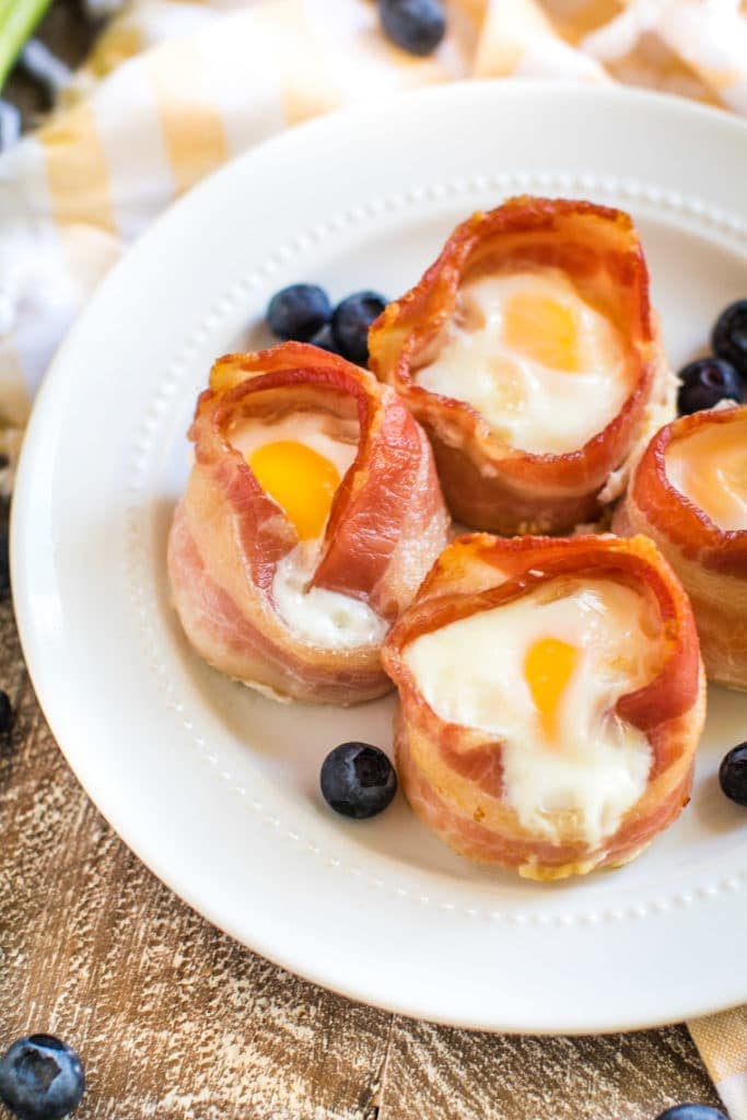 bacon and egg muffins on white plate