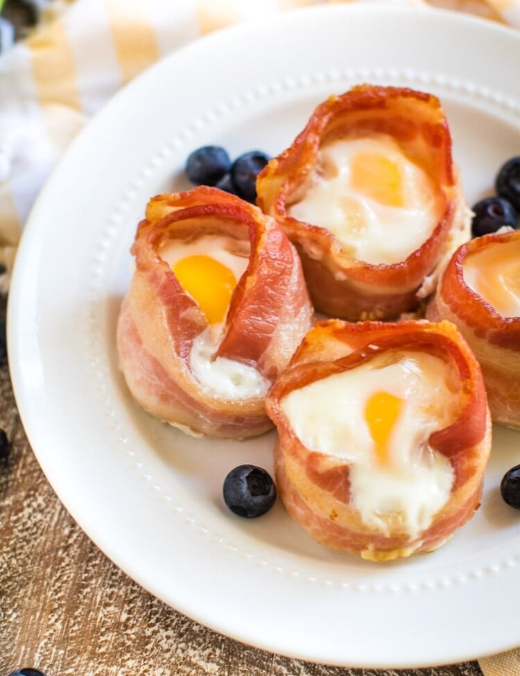 bacon and egg muffins on white plate