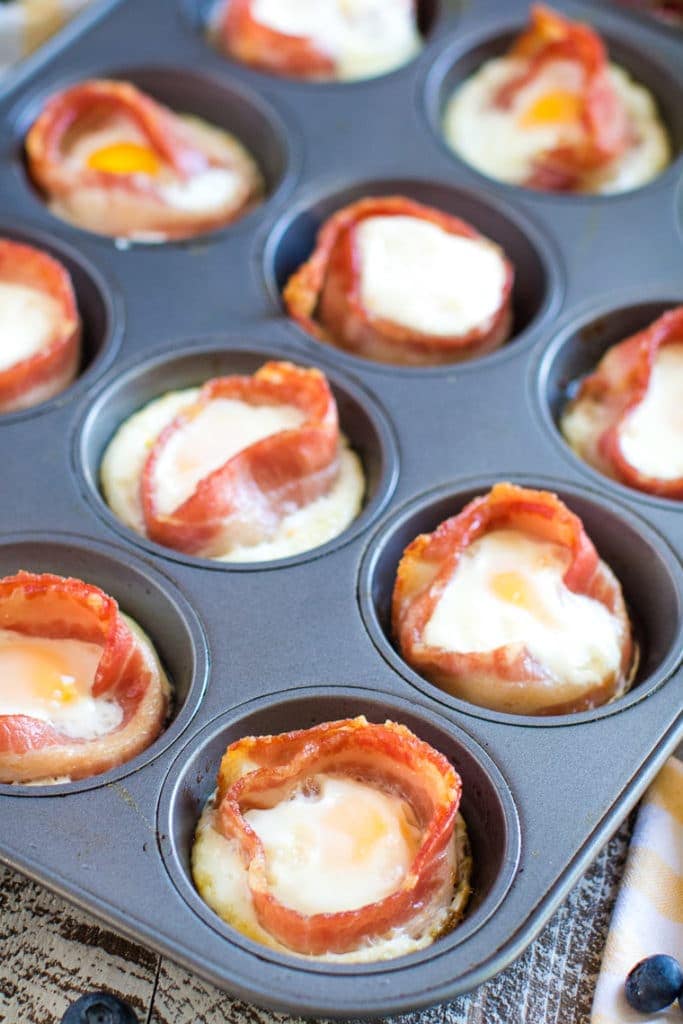 breakfast egg muffins with bacon in muffin tin