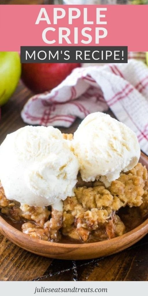 Apple Crisp Pin Image with text overlay of recipe name on top and below a photo of it topped with ice cream on brown wooden plate.