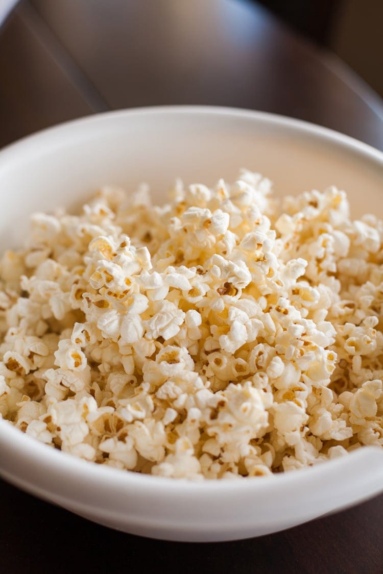 Homemade popcorn in white bowl