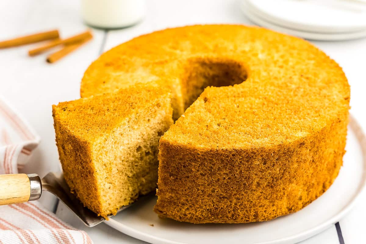 Cake server take a slice of Pumpkin Angel food cake out