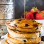 Stack of blueberry pancakes with syrup