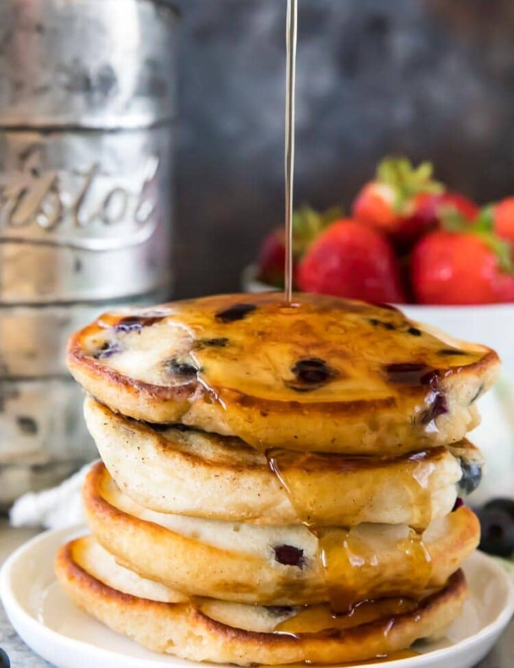 Stack of blueberry pancakes with syrup