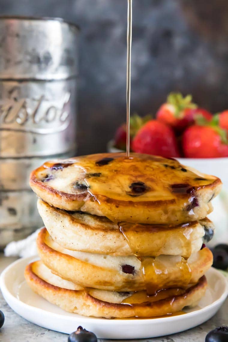 Stack of blueberry pancakes with syrup